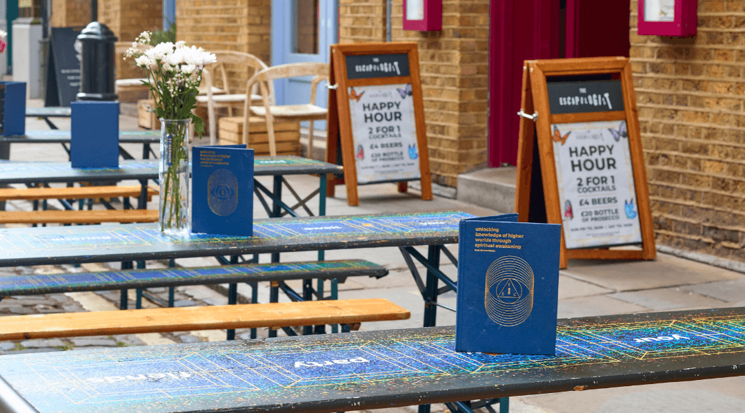 Menus on outside tables at The Escapologist bar in Covent Garden, London